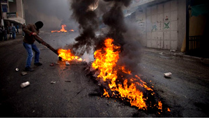 Mobilized by calls on Facebook, thousands of Arab protesters marched on Israel's borders with Syria, Lebanon and Gaza on Sunday in an unprecedented wave of demonstrations, sparking clashes that left at least 15 people dead in an annual Palestinian mourning ritual marking the anniversary of Israel's birth.